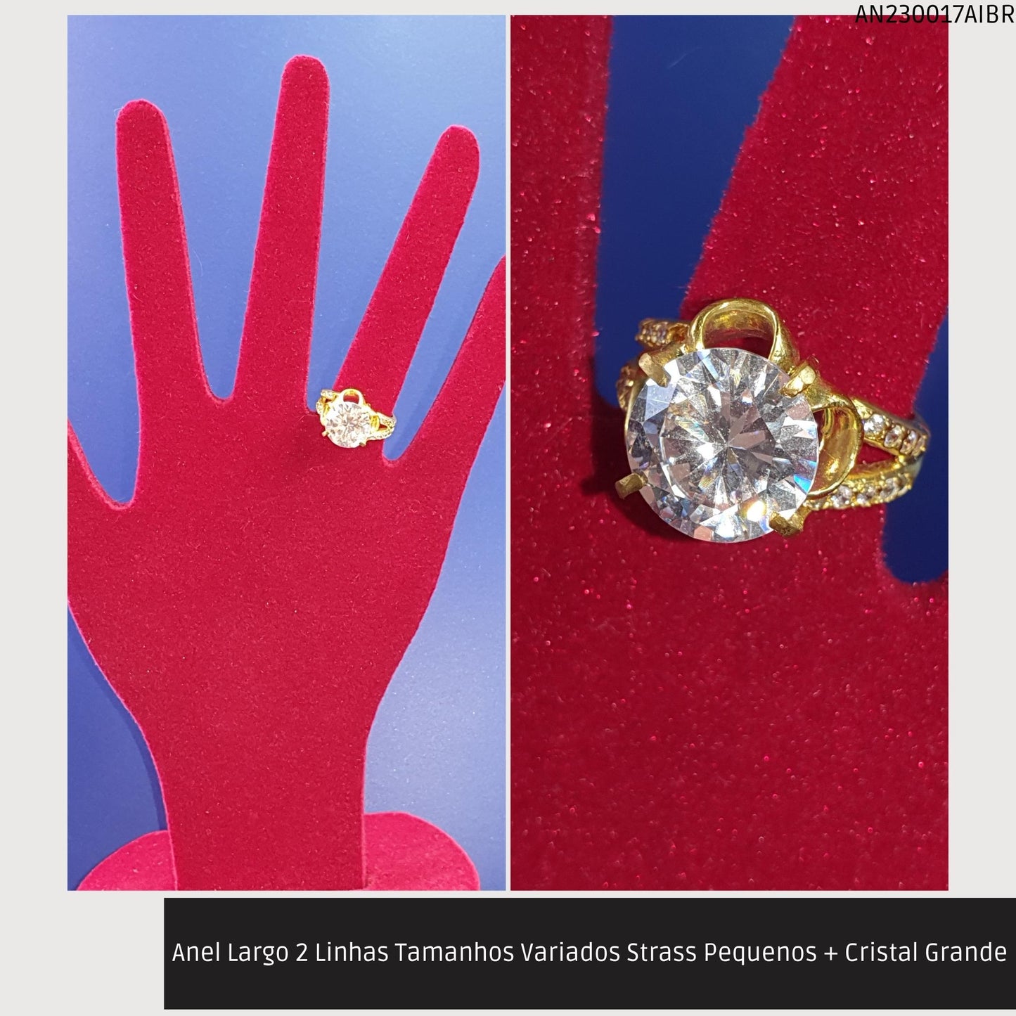 Anel Largo 2 Linhas Tamanhos Variados Strass Pequenos + Cristal Grande  - Código.: AN230017AIBR  - Peso.: 5.9 gr