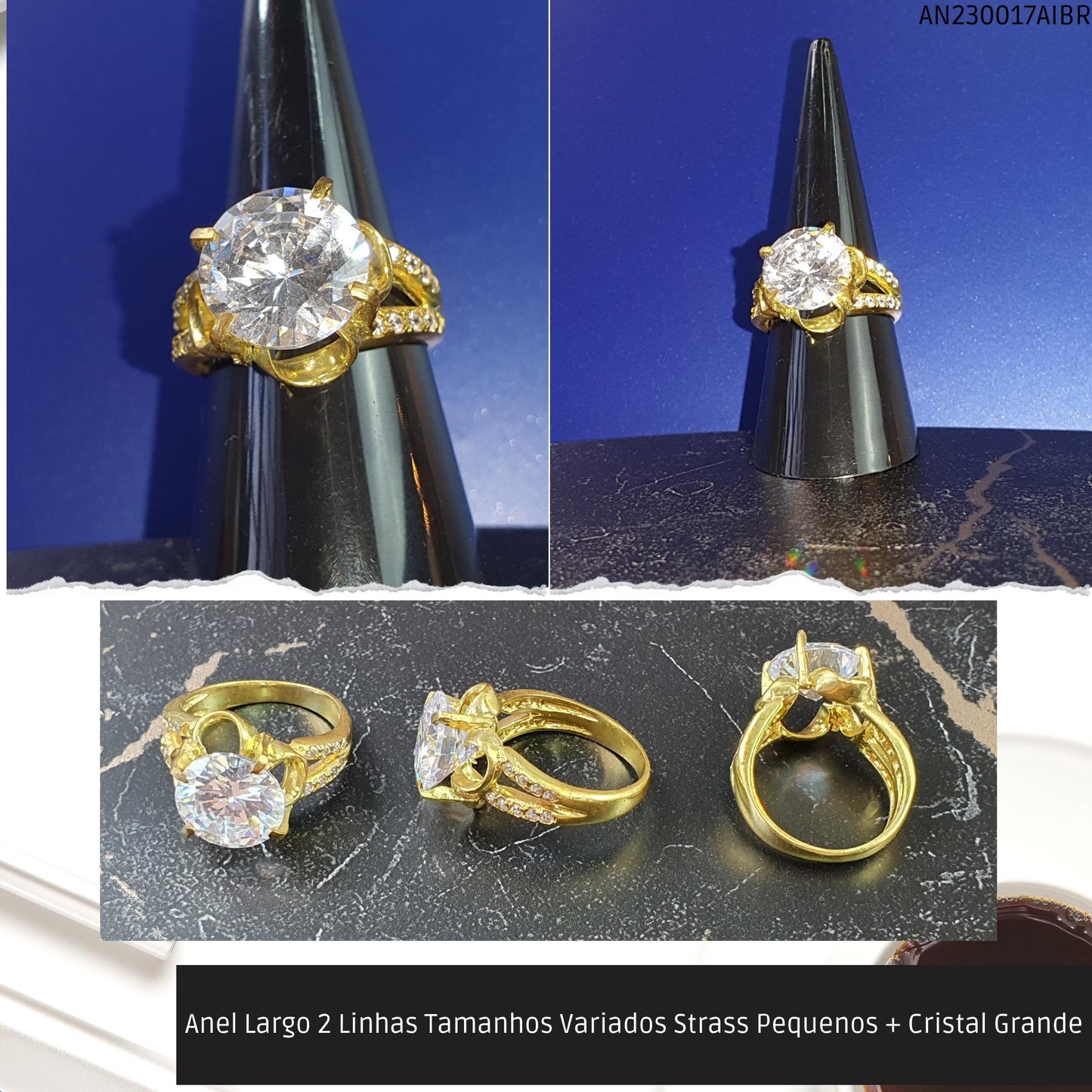 Anel Largo 2 Linhas Tamanhos Variados Strass Pequenos + Cristal Grande  - Código.: AN230017AIBR  - Peso.: 5.9 gr