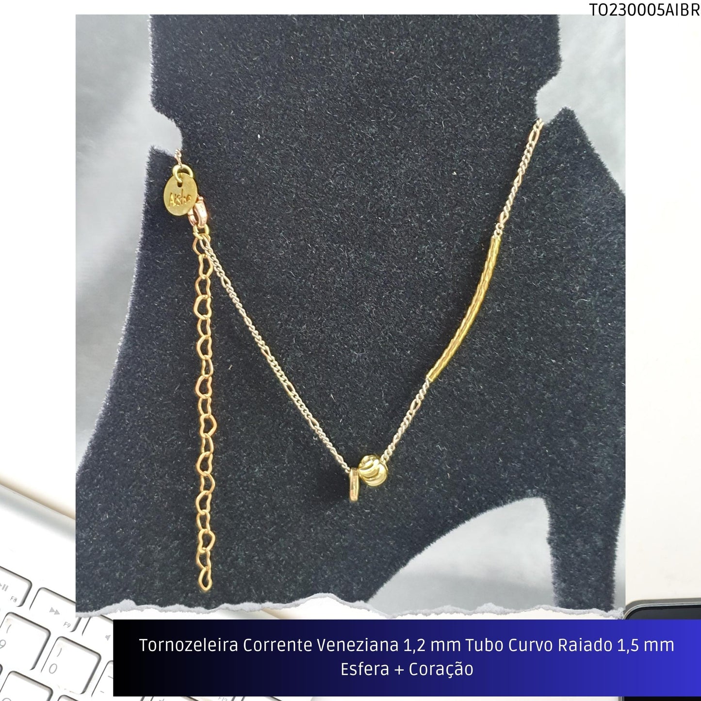 Tornozeleira Corrente Veneziana 1.2 mm Tubo Curvo Raiado 1.5 mm Esfera + Coração  - Código.: TO230005AIBR  - Peso.: 2.5 gr