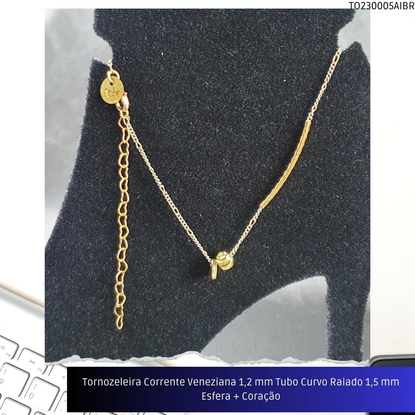 Tornozeleira Corrente Veneziana 1.2 mm Tubo Curvo Raiado 1.5 mm Esfera + Coração  - Código.: TO230005AIBR  - Peso.: 2.5 gr