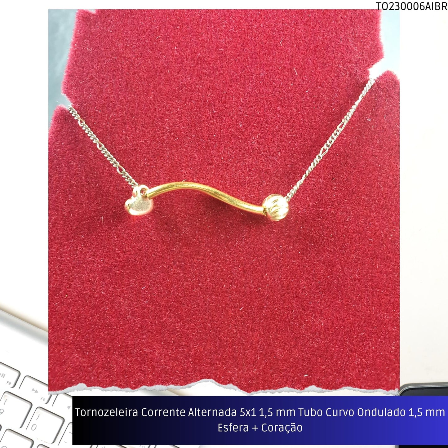 Tornozeleira Corrente Alternada 5x1 1.5 mm Tubo Curvo Ondulado 1.5 mm Esfera + Coração  - Código.: TO230006AIBR  - Peso.: 2.6 gr